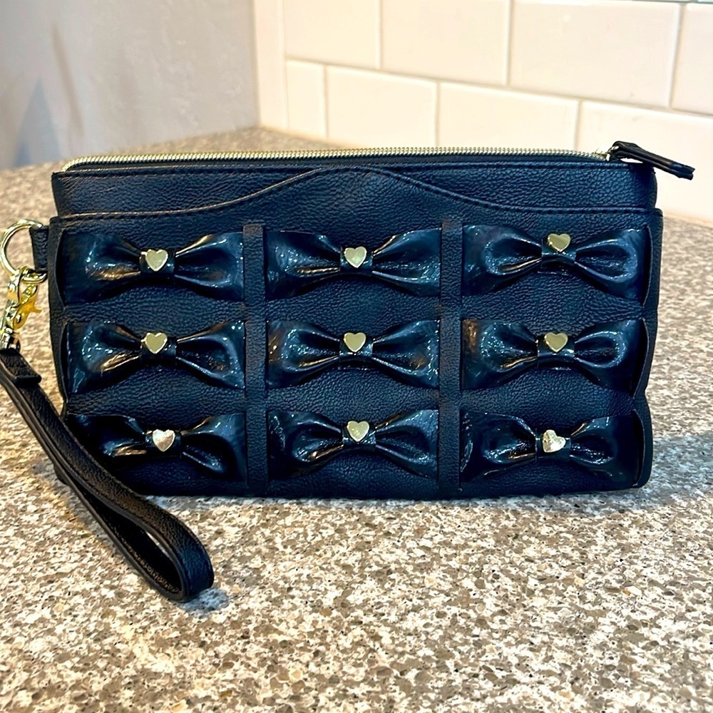 Betsy Johnson bows and hearts zip wristlet
